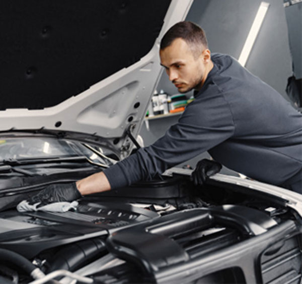 checking car engine.